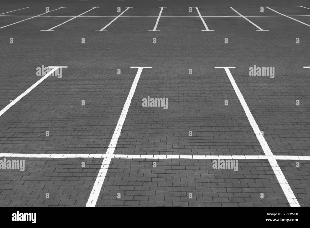 Empty car parking lots with white marking lines outdoors Stock Photo