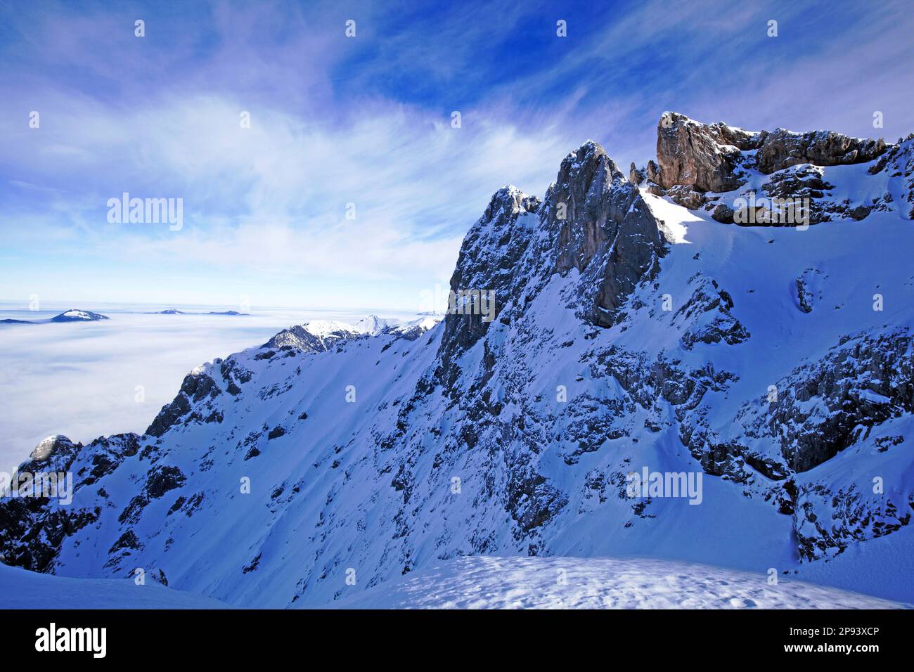 the rock towers of the Karwendelköpfe are neighbors of the Westliche Karwendelspitze, winter in the Karwendel mountains Stock Photo