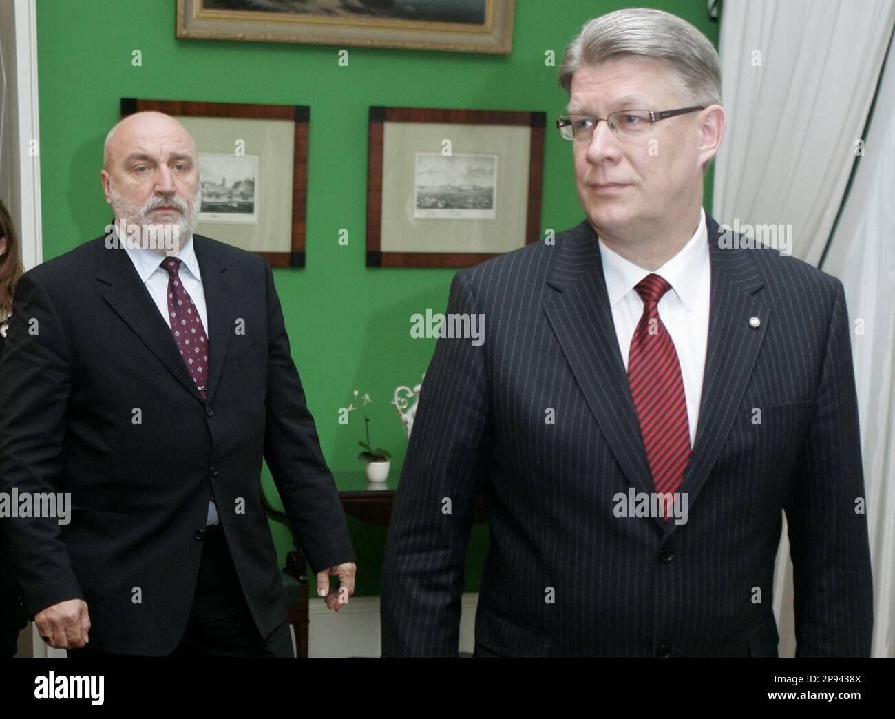 Latvian President Valdis Zatlers and Prime Minister Ivars Godmanis seen during their meeting in Riga, Latvia, Friday, Feb. 20, 2009. President Valdis Zatlers said he accepted the resignation of Prime Minister Ivars Godmanis and his administration, which had been in power since December 2007. Latvia's center-right coalition government resigned Friday after weeks of instability brought on by the Baltic country's economic collapse. (AP Photo) Stock Photo
