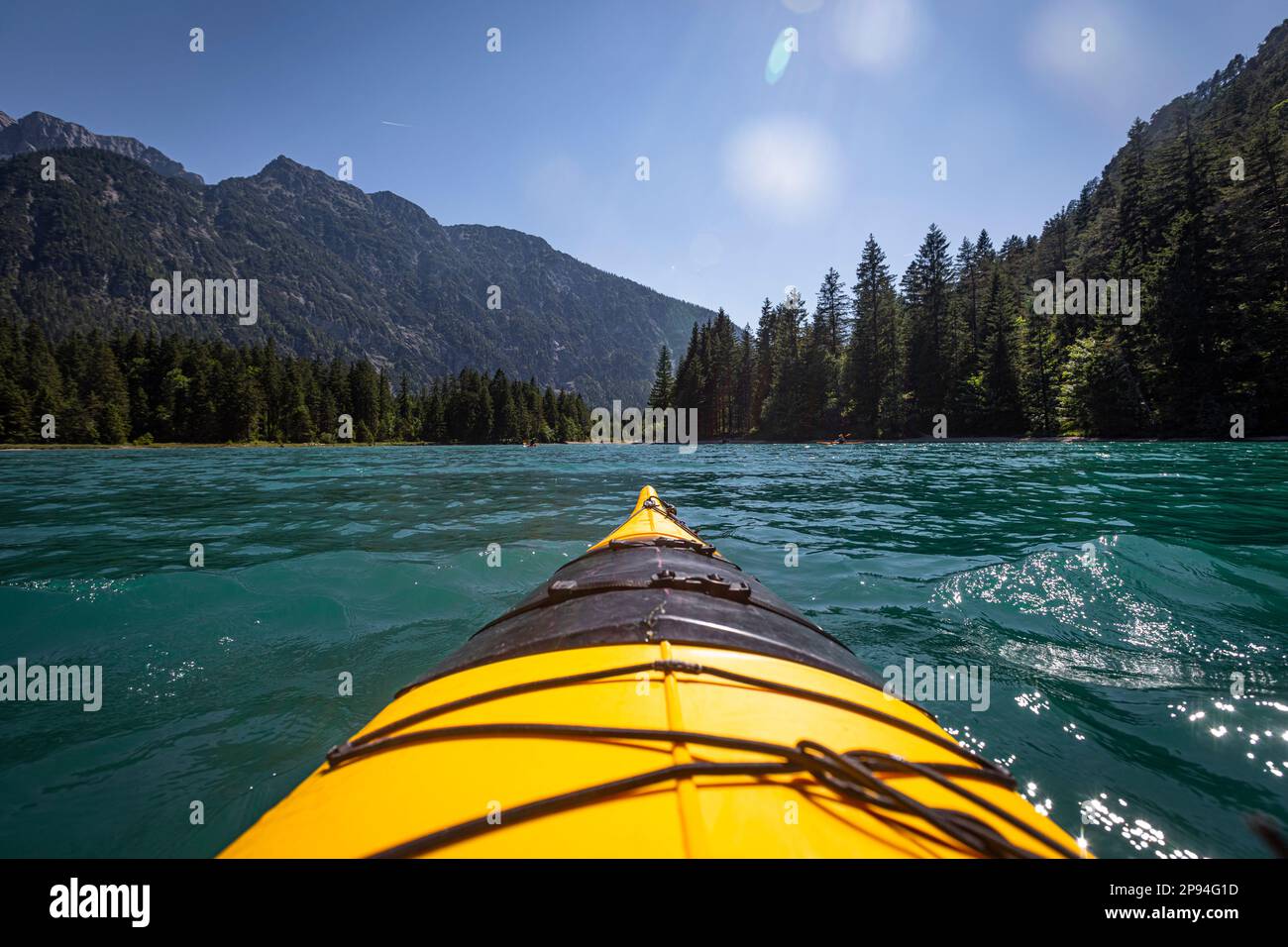 Bow tip of a sea kayak on Lake Heiterwang. Stock Photo