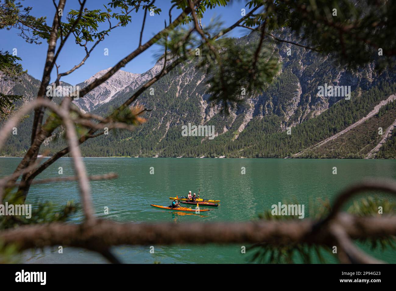 Sea kayaker on the Heiterwanger lake. Stock Photo