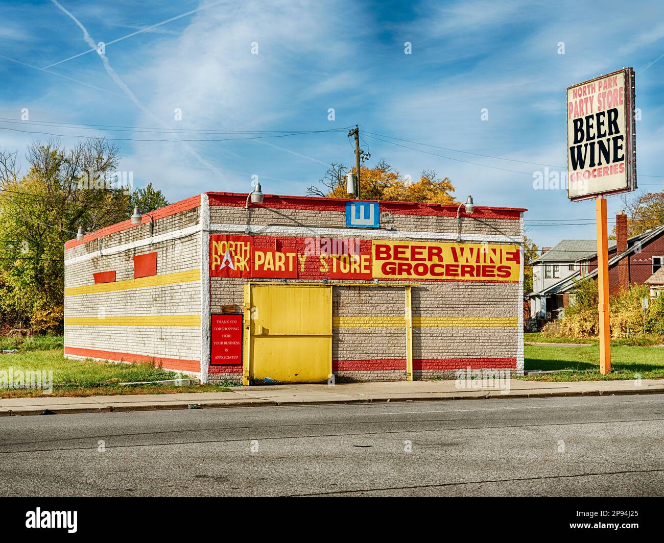 DETROIT, MICHIGAN - OCTOBER 20, 2020: A small store on Hamilton Avenue provides beer, wine and other groceries to the local community of Highland Park Stock Photo