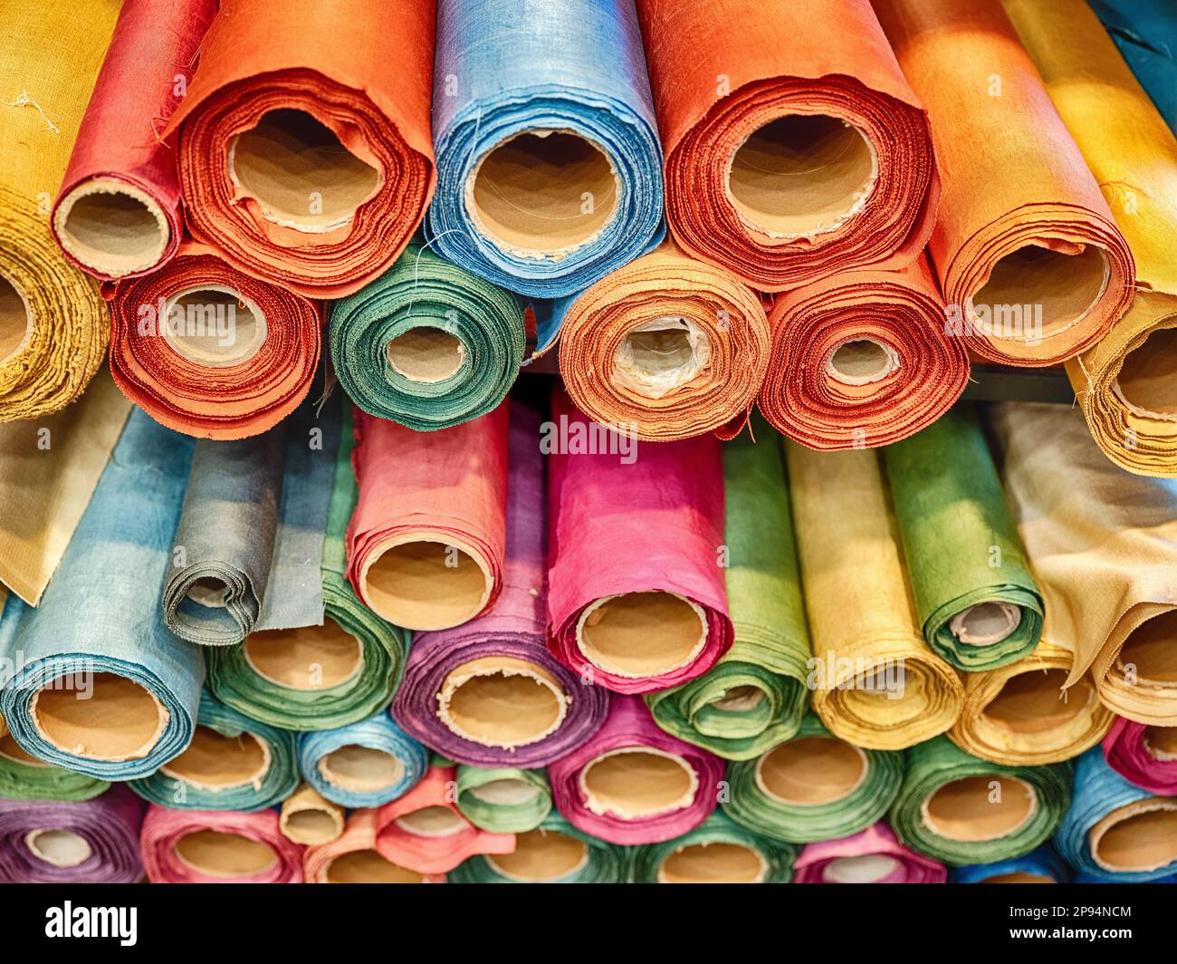 Colorful rolls of silk fabric are for sale in an Istanbul shop. Stock Photo