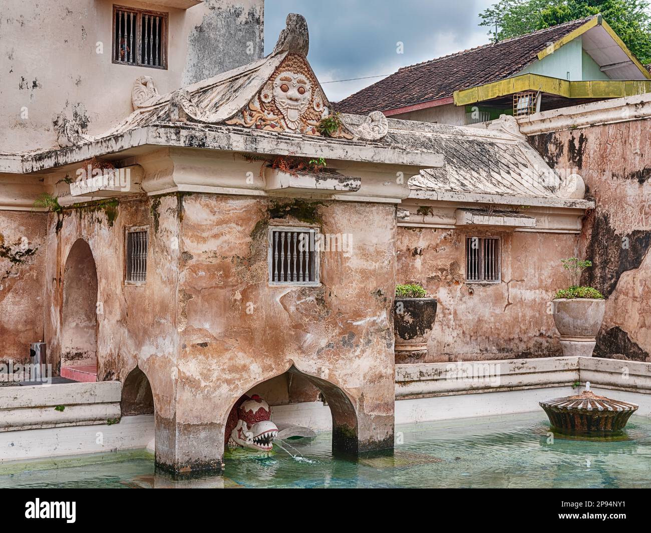 A pool is located in a courtyard at the Taman Sari complex in Yogyakarta, Indonesia. Stock Photo