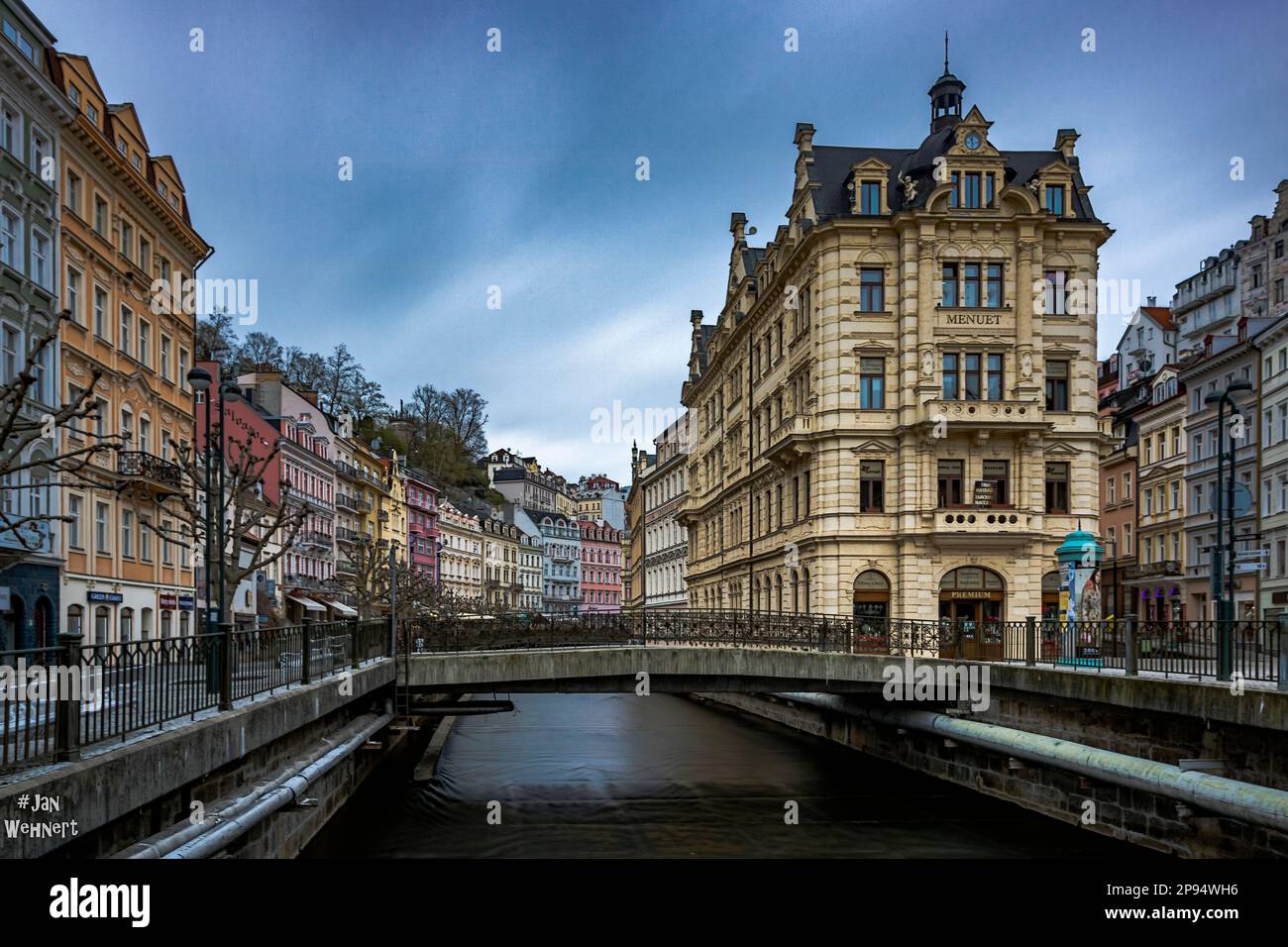 Old houses on the canal in winter, Karlovy Vary, Bohemia Czech Republic Stock Photo