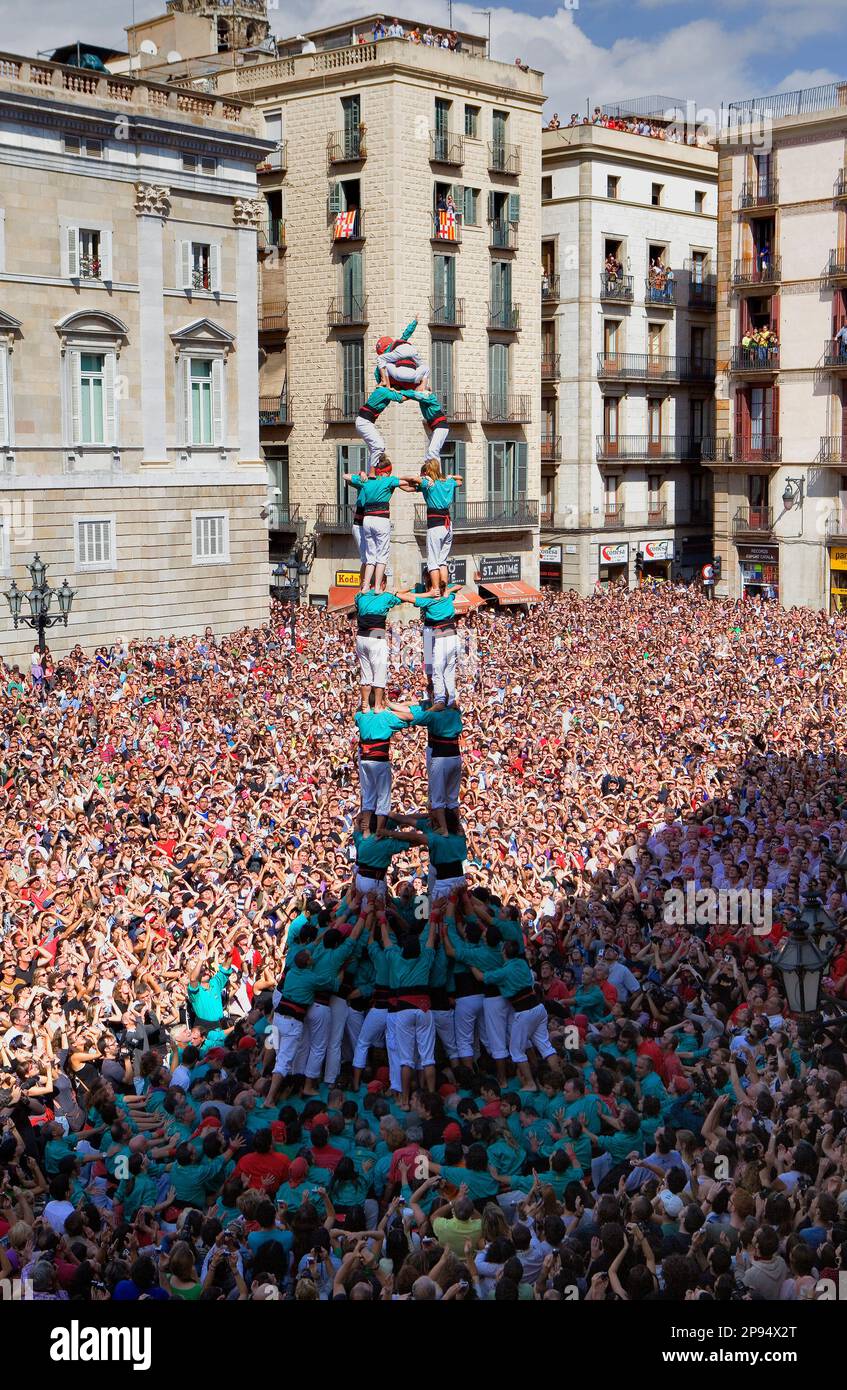 Castellers de Vilafranca.'Castellers' building human tower, a Catalan tradition.Festa de la Merçe, city festival. Plaça de Sant Jaume.Barcelona, Spain Stock Photo