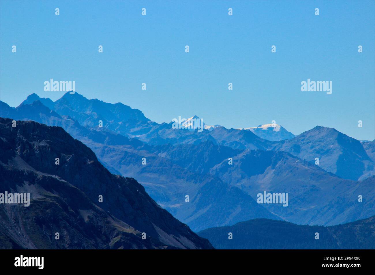 View from the summit of Daniel (2340m), highest peak of the Ammergau Alps, to the glacier-covered neighboring peaks, Lermoos, Zugspitzarena, Tyrol, Austria Stock Photo