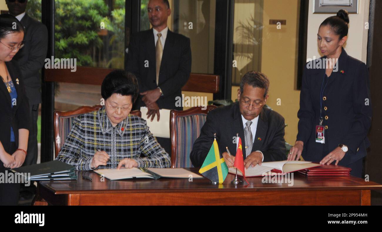 China'S Vice Minister Of Commerce Ma Xiuhong, Left, And Jamaica'S.