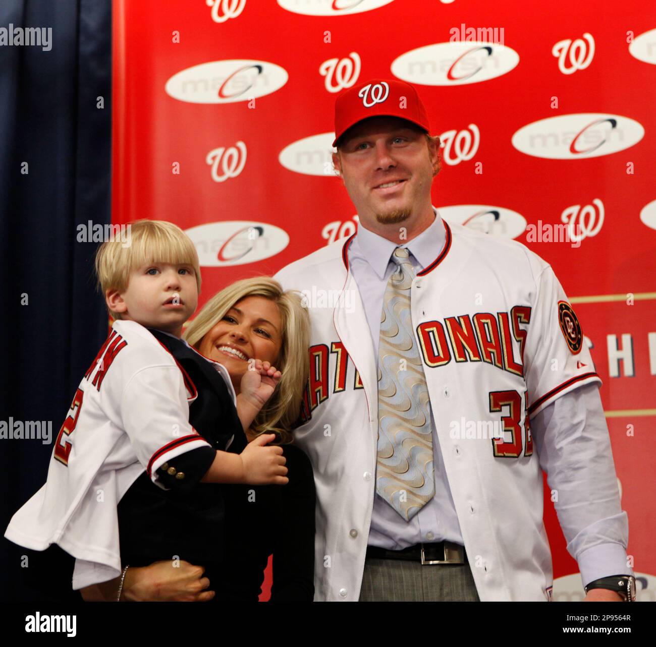 Washington Nationals baseball player Adam Dunn poses with his wife