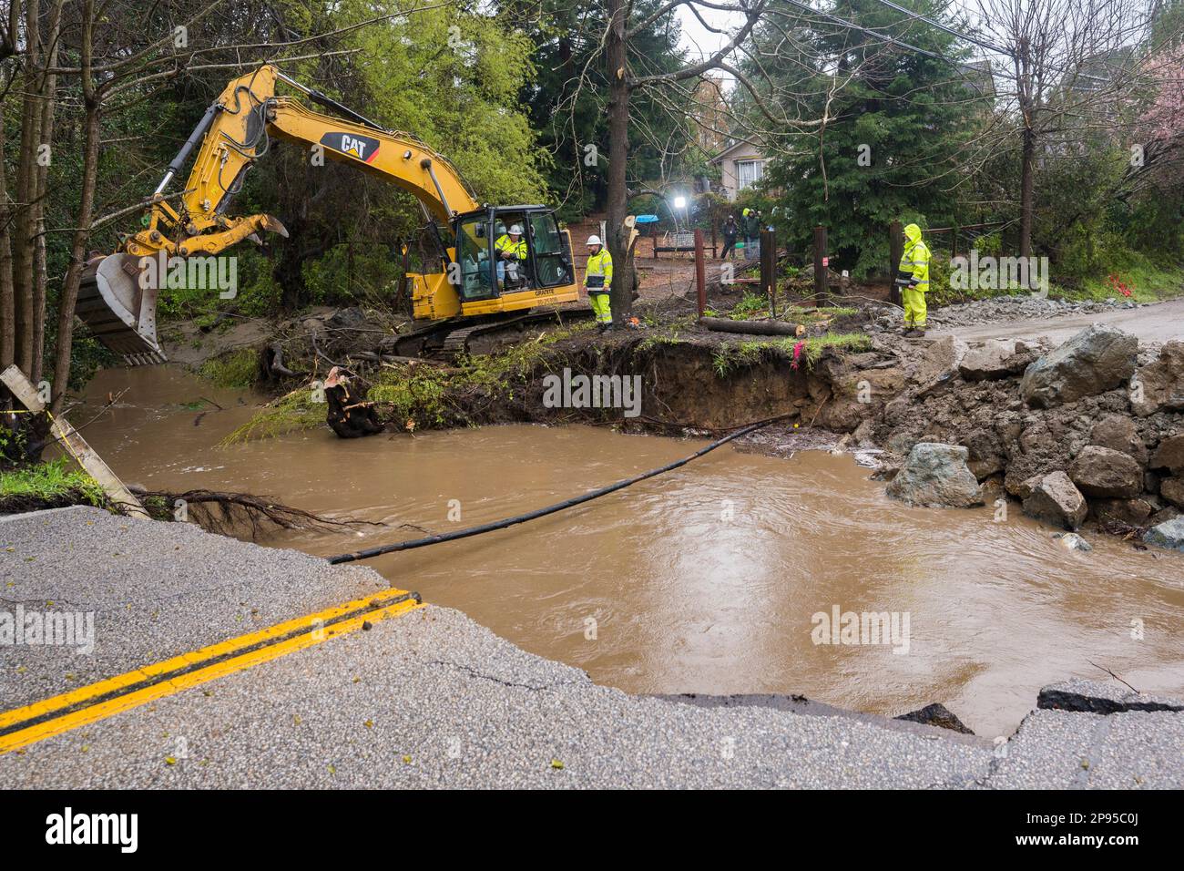 Crews assess storm damage, which washed out North Main Street in Soquel