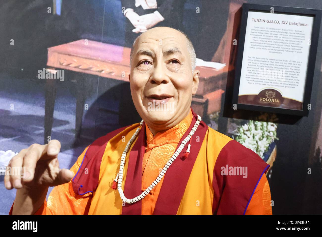 Krakow, Poland, 10.03.2023. 14th Dalai Lama Tenzin Gjaco wax figure at the Polonia Wax Museum. Stock Photo
