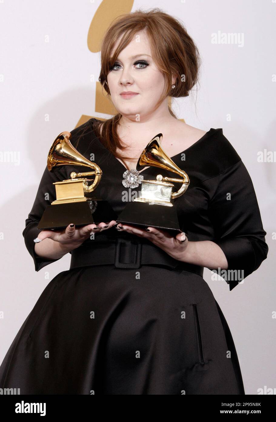 Adele holds the best female pop vocal performance and best new 