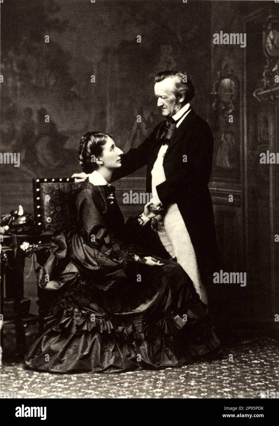 1872 , GERMANY : The german music composer RICHARD WAGNER ( 1813- 1883 ) with wife COSIMA WAGNER LISZT ( daughter of music composer Franz Liszt and countess Marie de Flavigny d'Agout , 1837 - 1930 ), married with music conductor Hans Von Bulow , close friend of Wagner . Photo by Fritz Luckhardt . - MUSIC - CLASSICAL - MUSICA CLASSICA - LIRICA - OPERA - BAVARIA - BAVIERA - compositore - musicista - portrait - ritratto - profilo - profile - lovers - amanti - COMPOSITORE - OPERA LIRICA  - MUSICISTA   - collar - colletto  - CRAVATTA - TIE - -- ARCHIVIO GBB Stock Photo