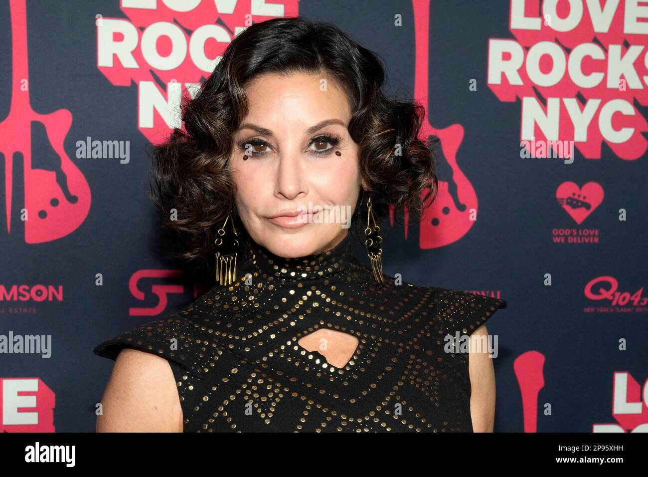 Gina Gershon attends the 7th annual Love Rocks NYC concert benefitting
