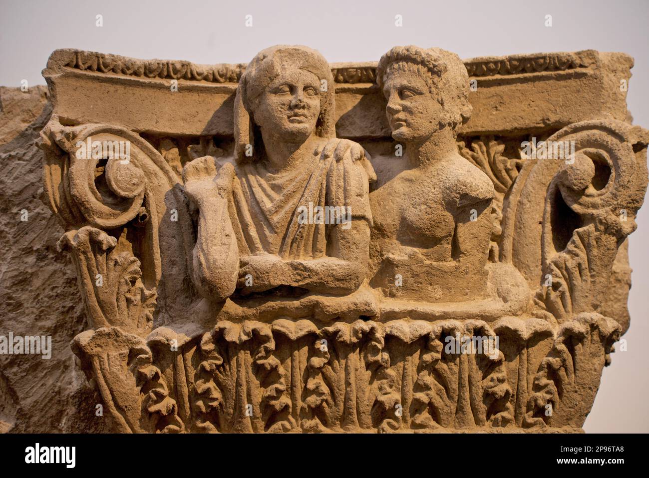 Ornately carved Roman tufa stone capital from Pompeii depicting married couple. Second half of second century BCE.   Pompeii's Antiquarium first opened in 1873, but closed in 1980, only reopening as a museum again with a permanent display of artefacts in 2021. Pompeii, Naples, Italy Stock Photo