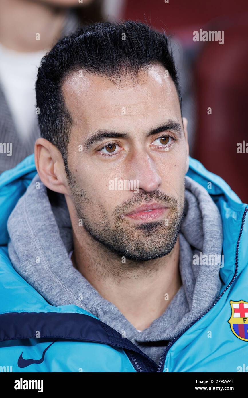 BARCELONA FEB 16 Busquets sits on the bench during the Champions