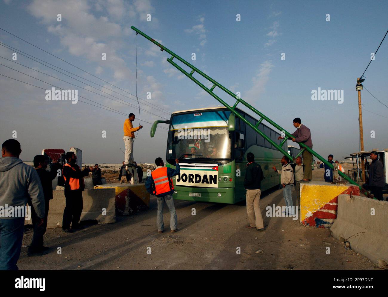 Buses carrying Jordanian doctors and trucks with medical supplies are