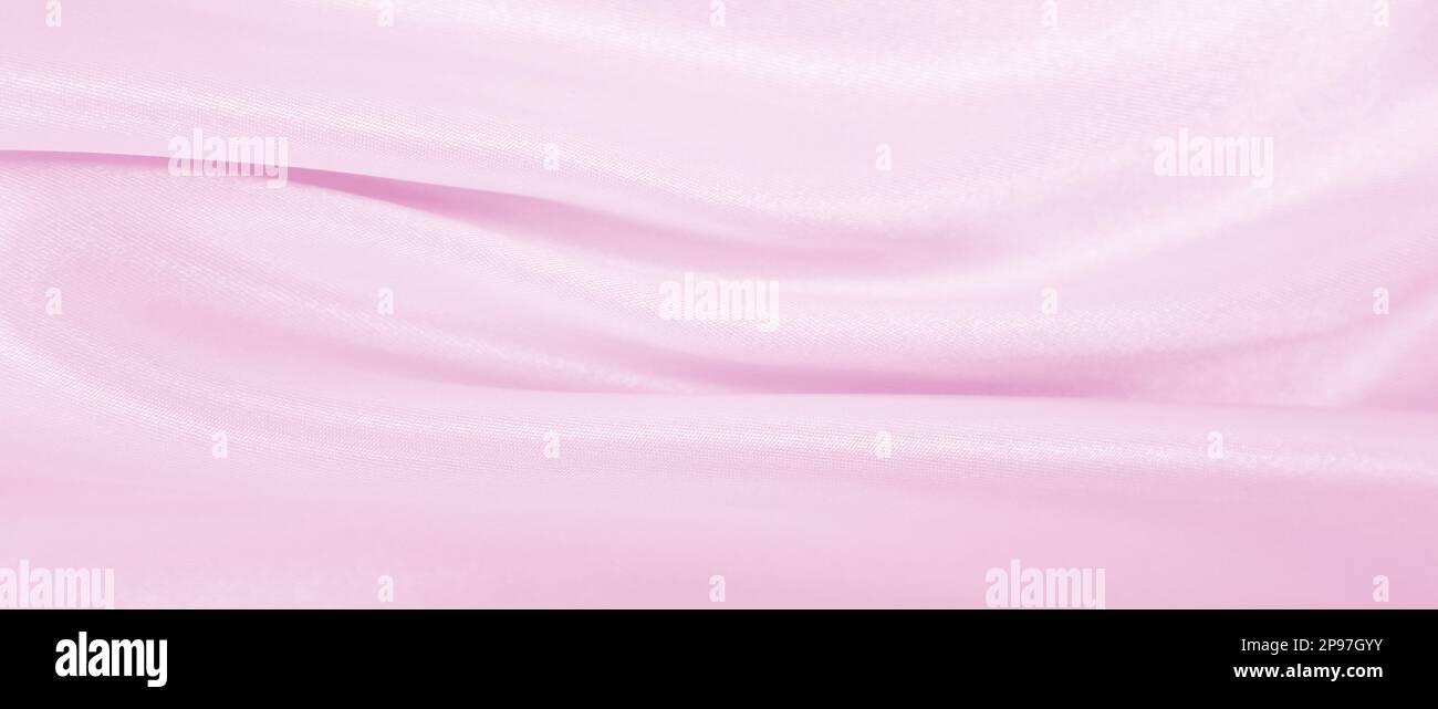 Smooth elegant pink silk or satin texture can use as wedding background ...