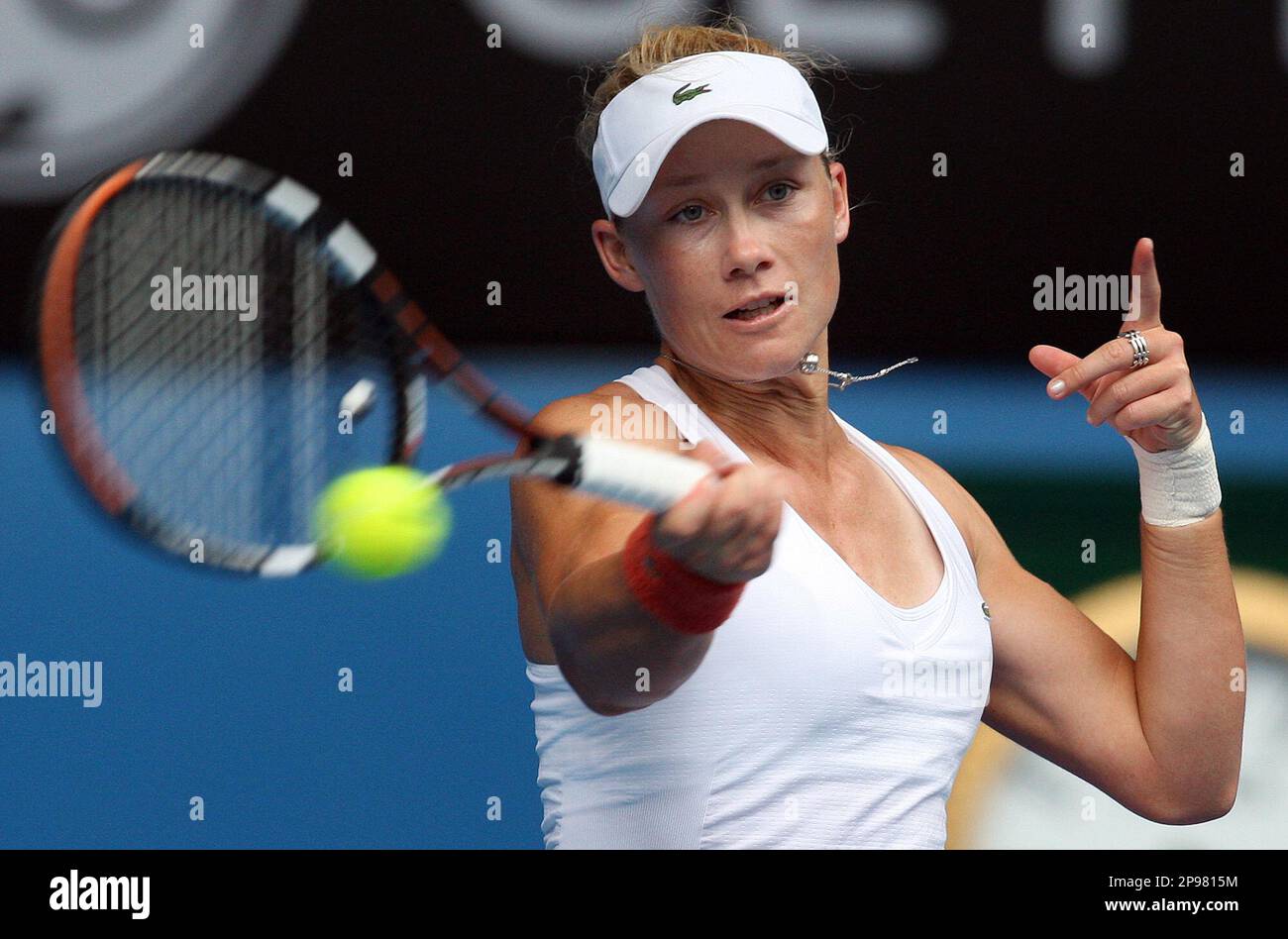 Australia's Samantha Stosur returns the ball during her Women's singles