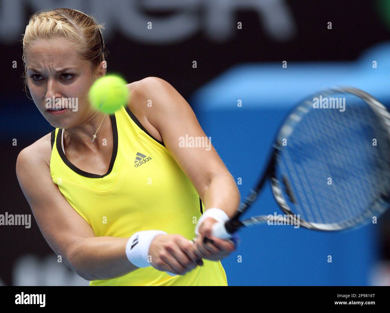 Germany's Sabine Lisicki returns the ball during her Women's singles