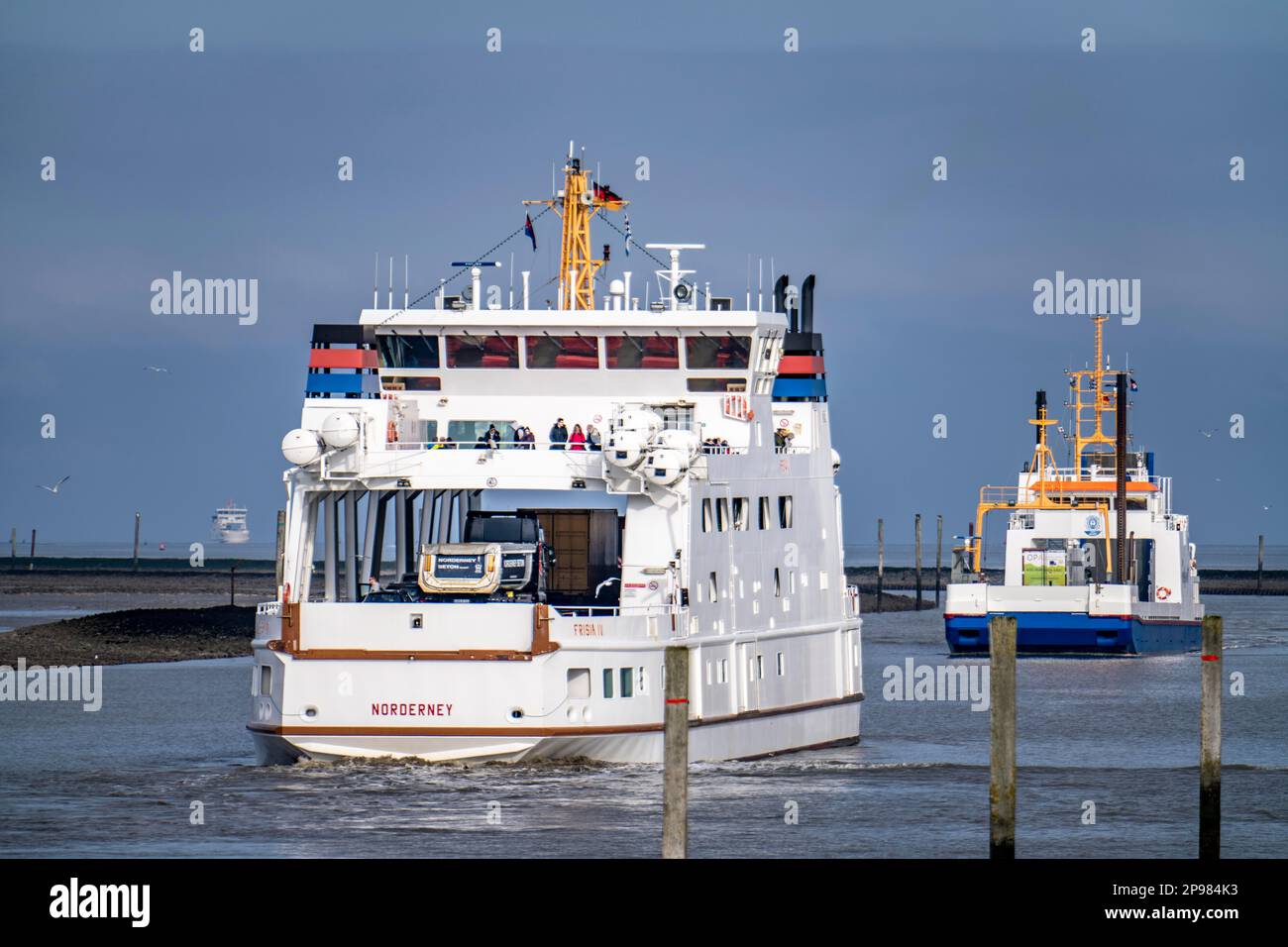 Ferry from Norddeich to the island of Norderney, for vehicles and passengers, Frisia IV, in the Busetief Canal, Lower Saxony, Germany Stock Photo