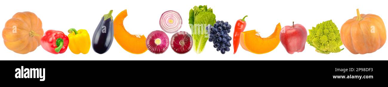 Colorful vegetables and fruits in row isolated on white background. Stock Photo