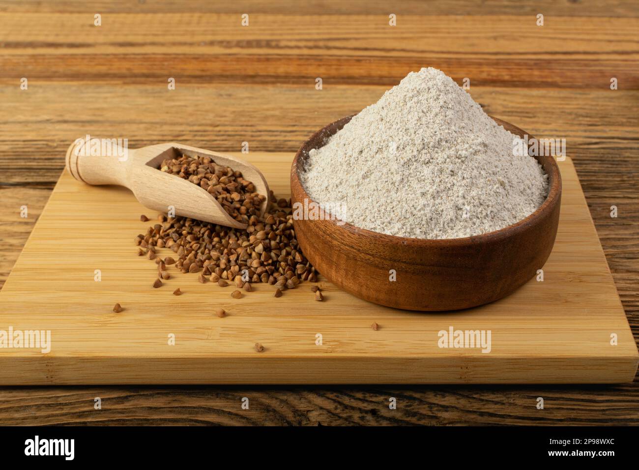 Buckwheat Flour Pile in Wood Bowl, Dry Buck Wheat Powder, Buckwheat Gluten Free Flour on Wooden