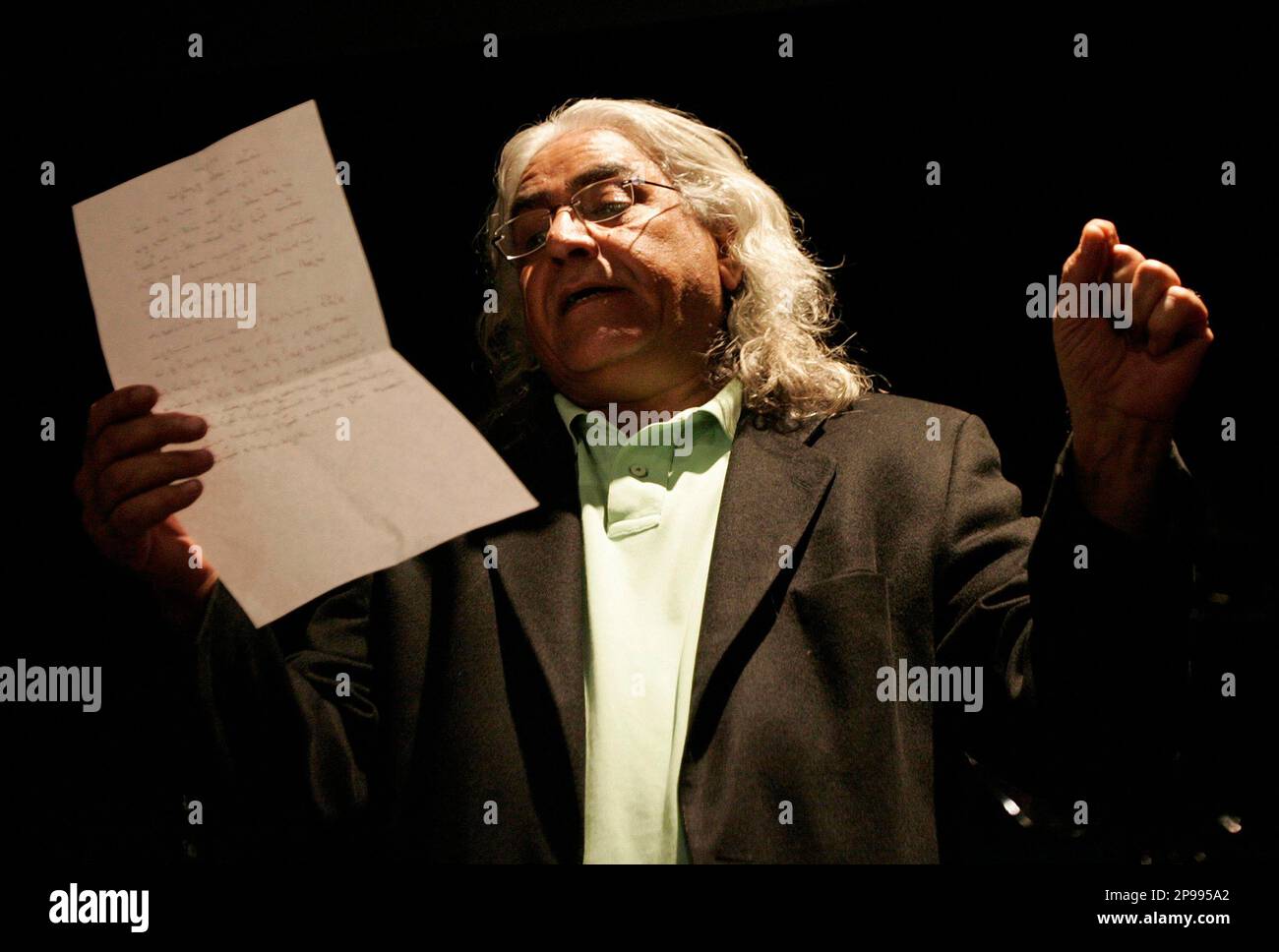 APN ADVANCE FOR SUNDAY JAN 18** Iraqi playwright and director Jawad  al-Assadi recites a poem during his first drama play, Women Sexophone, at  Babel Theater in Beirut, Lebanon, Dec. 5, 2007. After