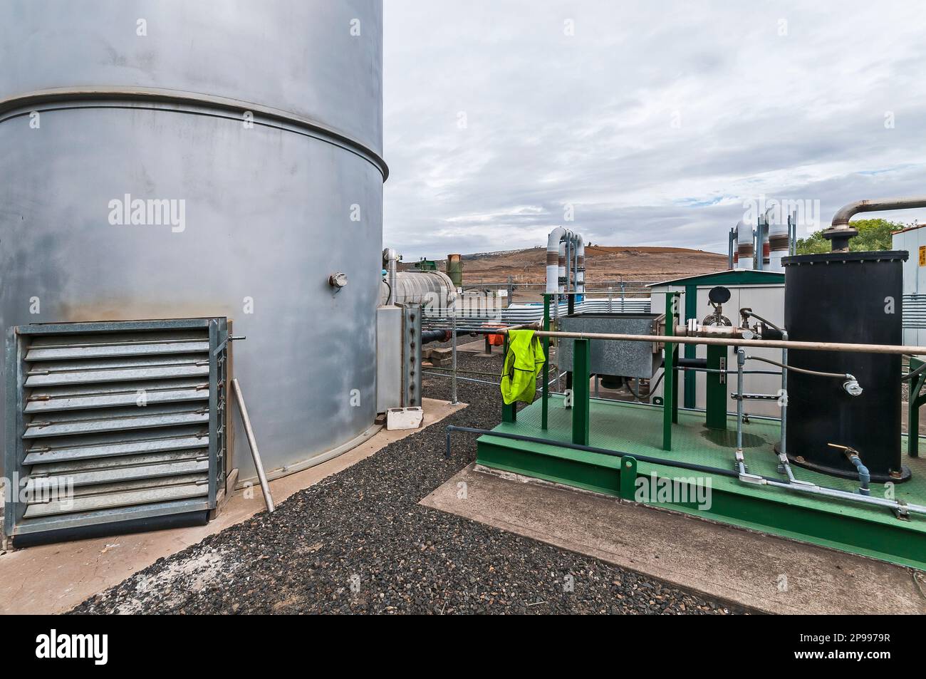 A fenced area containing tanks for methane gas which is generated by and in an active landfill