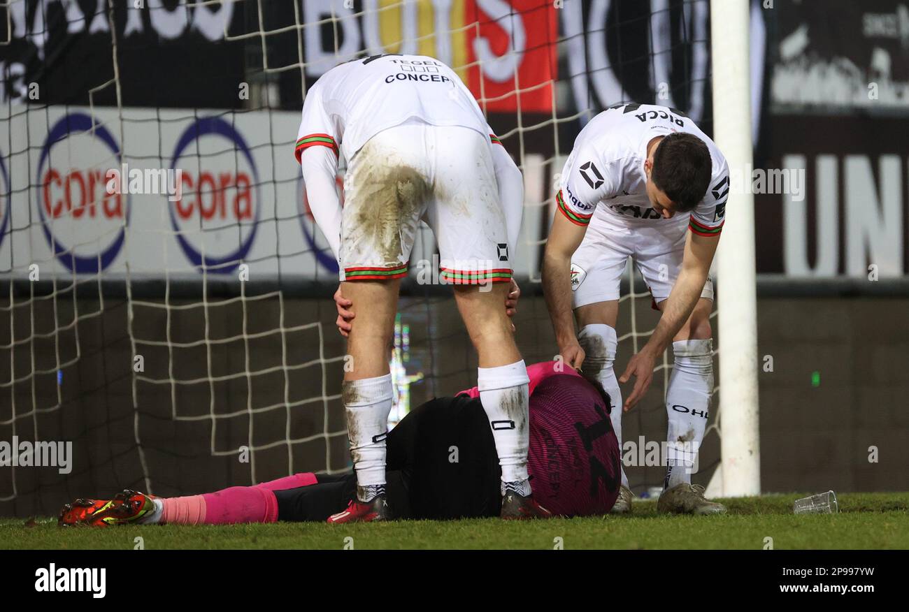 Belgium. 10th Mar, 2023. Charleroi's Valentin Ozornwafor lies on the