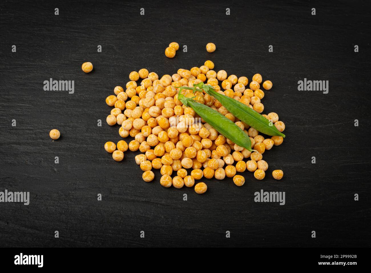 Dry Yellow Peas on Black Background, Whole Pea Pile, Raw Legume