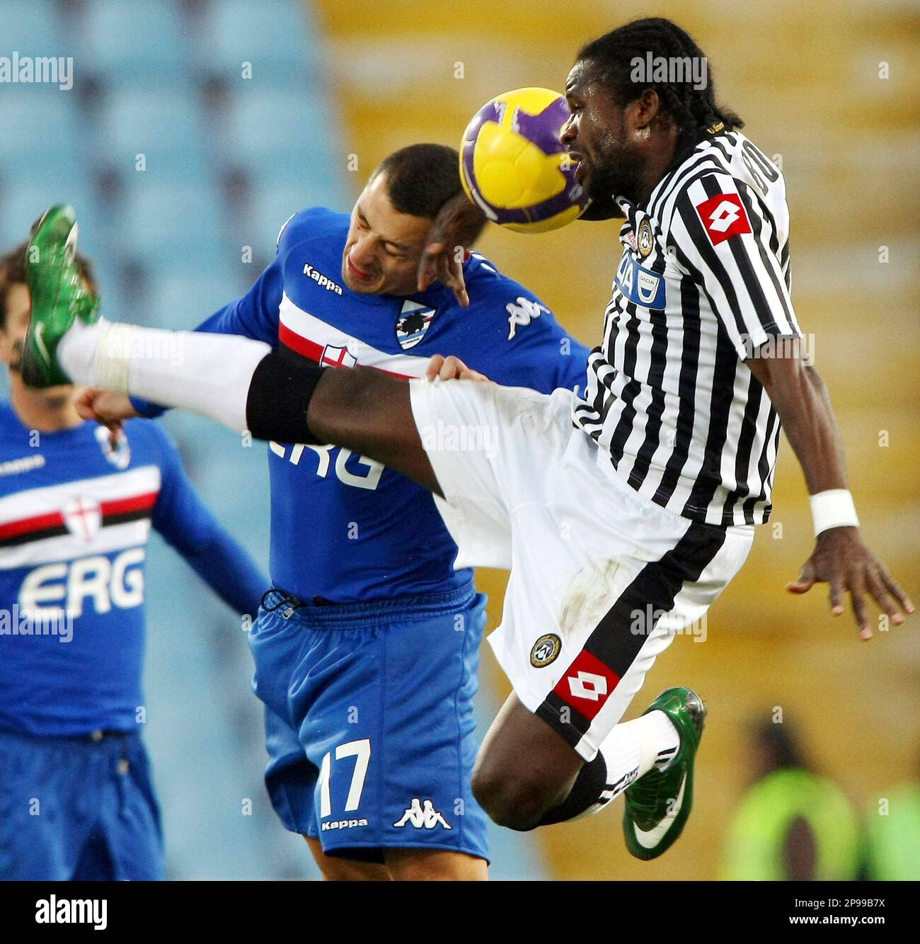 Udinese midfielder Christian Obodo, right, of Nigeria, jumps for he ball  with Sampdoria midfielder Angelo Palombo during the Serie A soccer match at  the Friuli stadium, in Udine, Italy, Sunday, Jan 11,