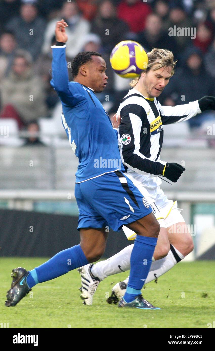 Juventus midfielder Pavel Nedved of Czech Republic, right, fights for the  ball with Siena midfielder Douglas Ricardo Packer of Brazil during a Serie  A soccer match between Juventus and Siena at Turin's