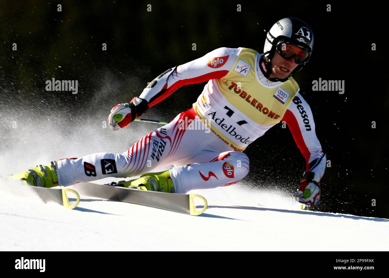 Austrias Christoph Gruber speeds down the course on his way to clock the third fastest time during the first run of an alpine ski, Mens World Cup giant slalom race, in Adelboden,
