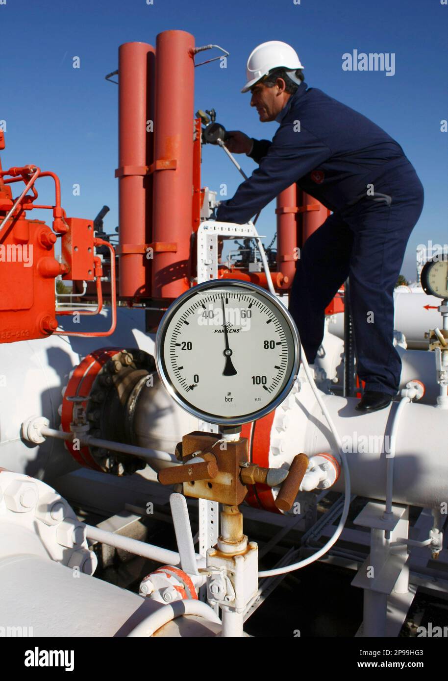 Halil Dogan a gas pipeline worker checks the valves at the