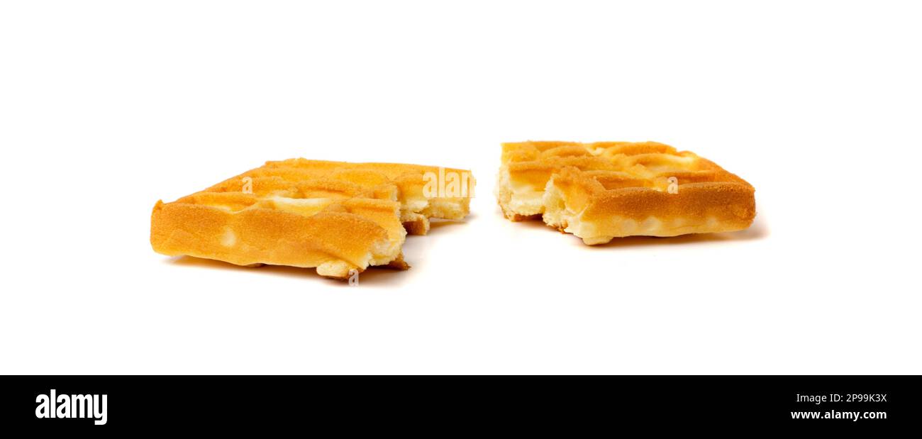 Broken Belgian Waffle Isolated, Square Waffled Cookie, Soft Golden Belgium Waffles Bites, Wafer Biscuit Breakfast on White Background Top View Stock Photo