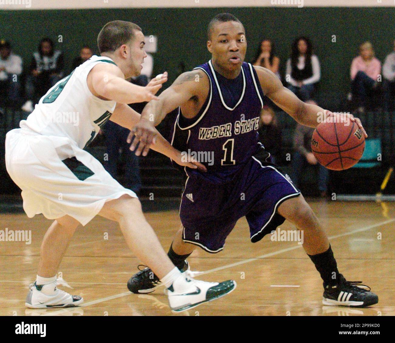 Weber State s Damian Lillard 1 drives against Portland State s