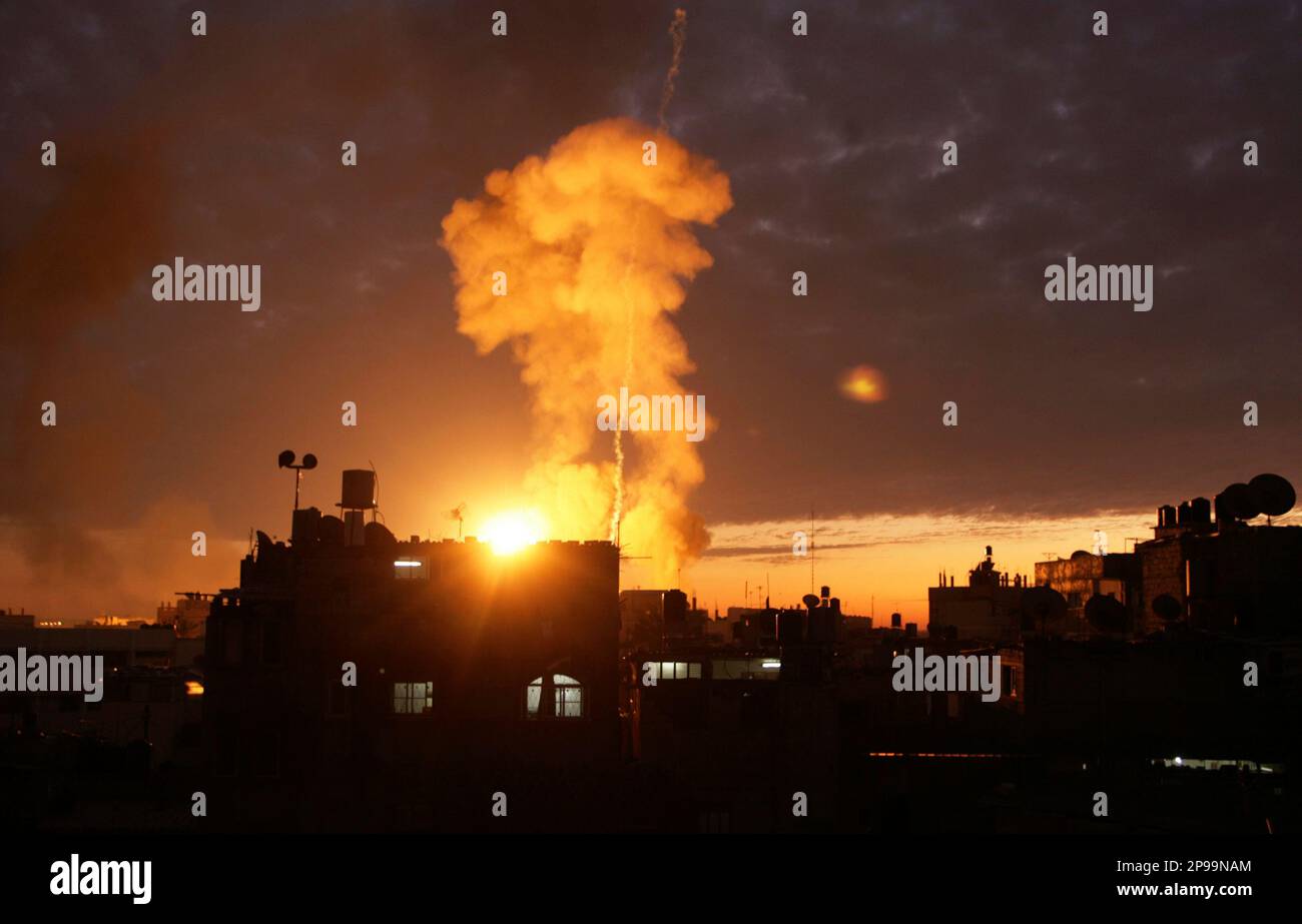 ** FILE ** In this Saturday, Jan. 3, 2009 file photo, smoke rises following an Israeli airstrike on an area known to have smuggling tunnels in Rafah, in the southern Gaza Strip on the border with Egypt. Angry at Hamas' ability to fire rockets at Israel, the United States last year allocated $23 million in American taxpayer money to help train Egyptian officials to stop the tunnel smuggling into Gaza - but months later, the American money had achieved little noticeable effect. (AP Photo/Eyad Baba, File) Stock Photo