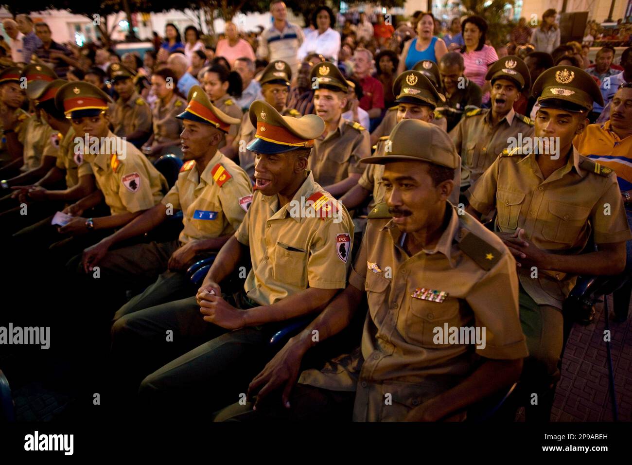 Cuban army officers chant revolutionary slogans during the 50th ...