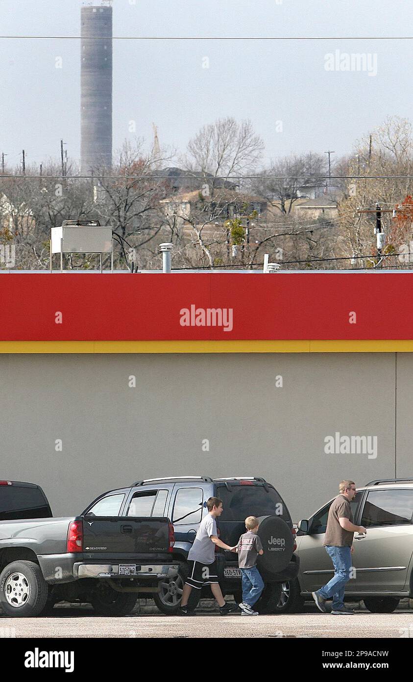 A family makes a stop at a convenience store in downtown Riesel, Texas
