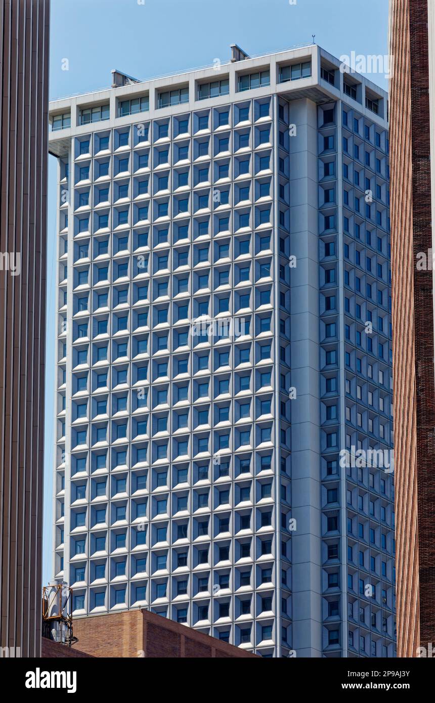 NYC Financial District: One New York Plaza (1 Water Street) is distinctive for its light gray “waffle iron” or “beehive” façade. Stock Photo
