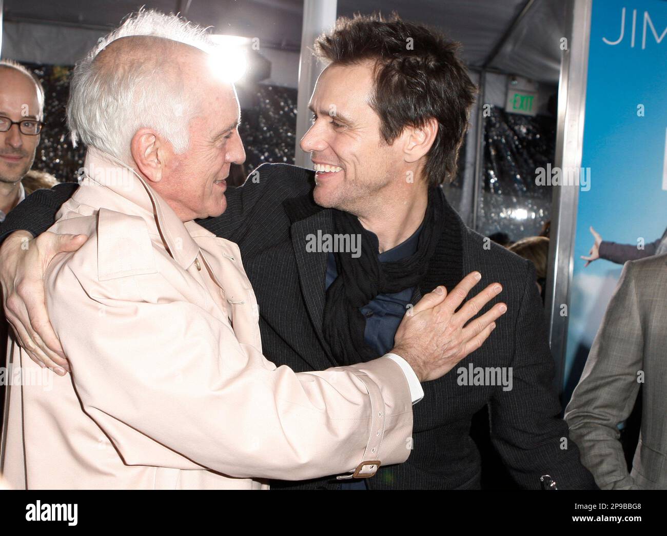 Cast members Jim Carrey, right, and Terence Stamp greet each other at