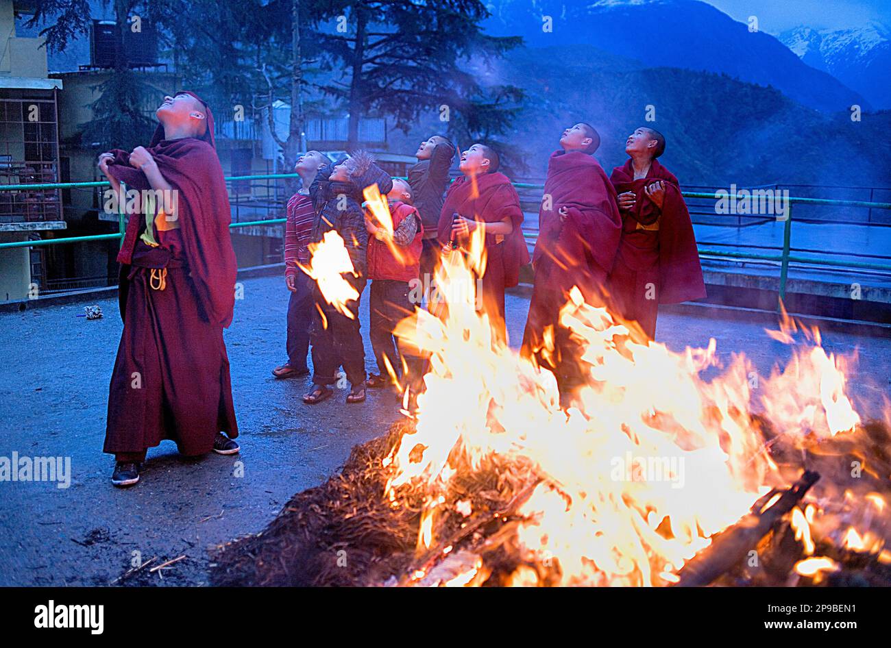 Young monks, ritual to burning evil at Losar new year, in Namgyal Monastery,in Tsuglagkhang complex. McLeod Ganj, Dharamsala, Himachal Pradesh state, Stock Photo