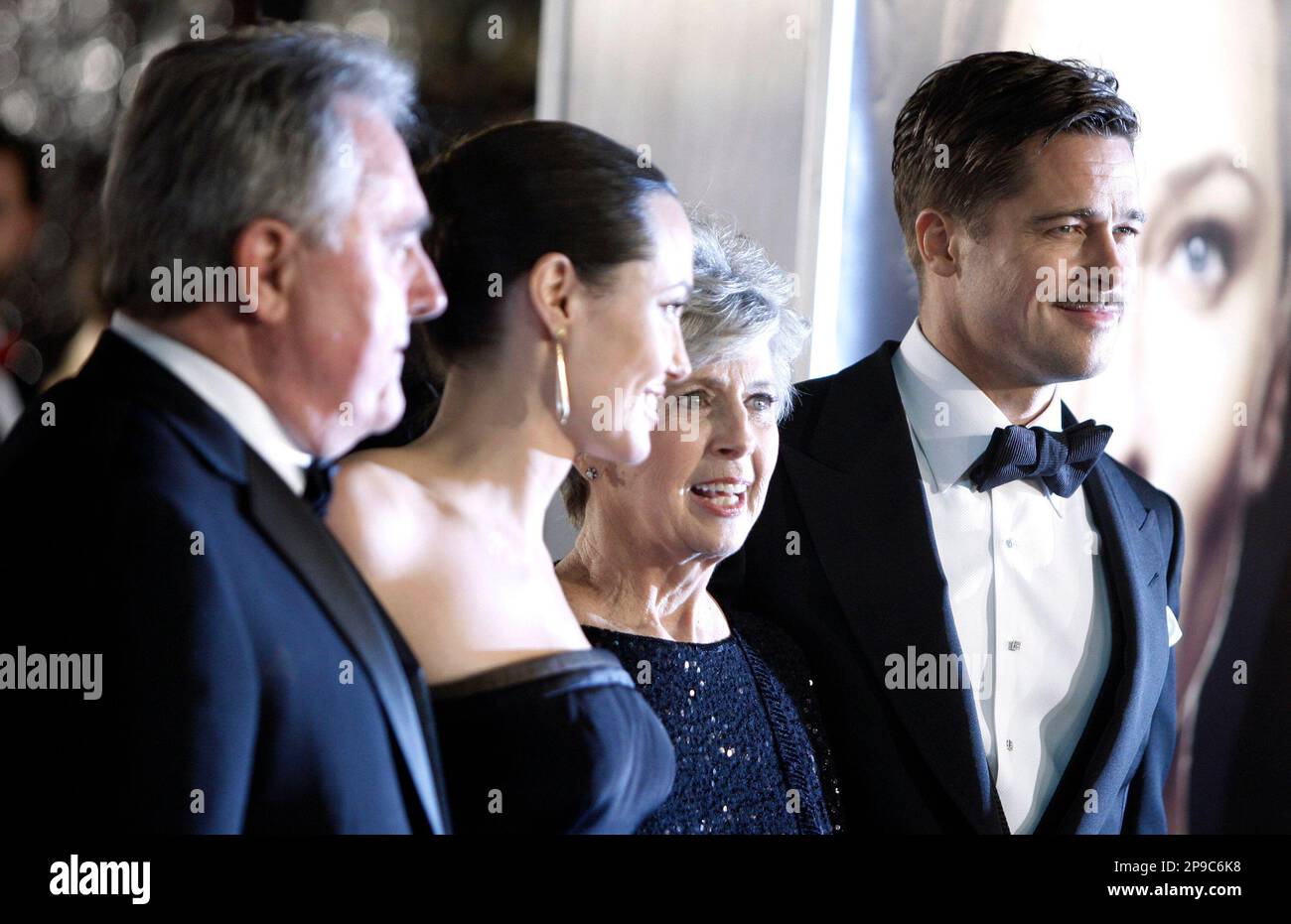 From left, Brad Pitt's father, William Pitt, Angelina Jolie, Brad Pitt