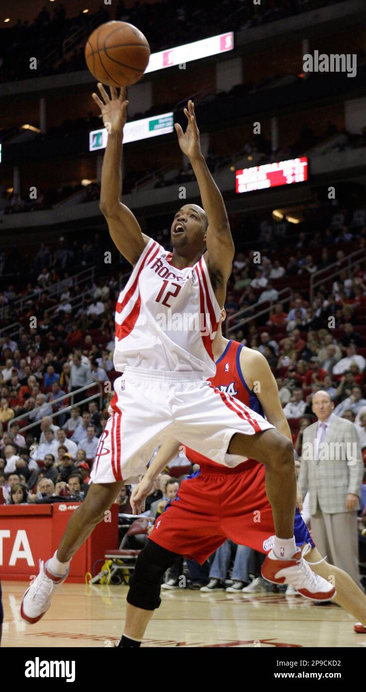 Houston Rockets' Rafer Alston (12) shoots during the fourth quarter of ...