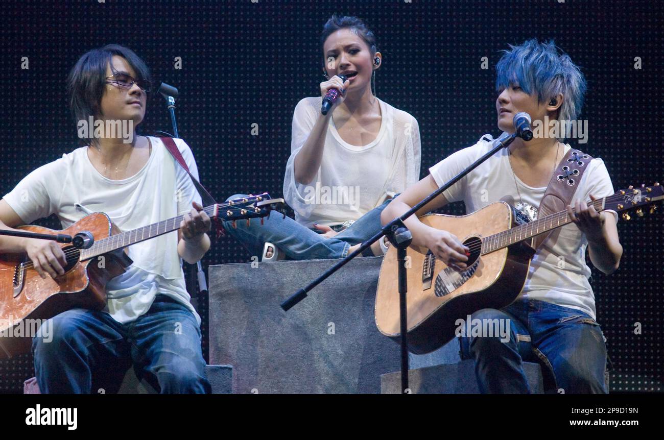 Taiwanese band F.I.R members, from left, Ian, Faye and Real, perform ...