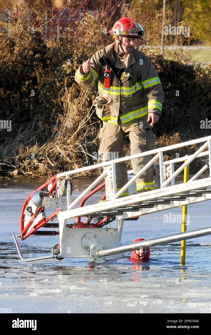 Lt. Lee Stadler of the Two Rivers Fire Department calls for help 