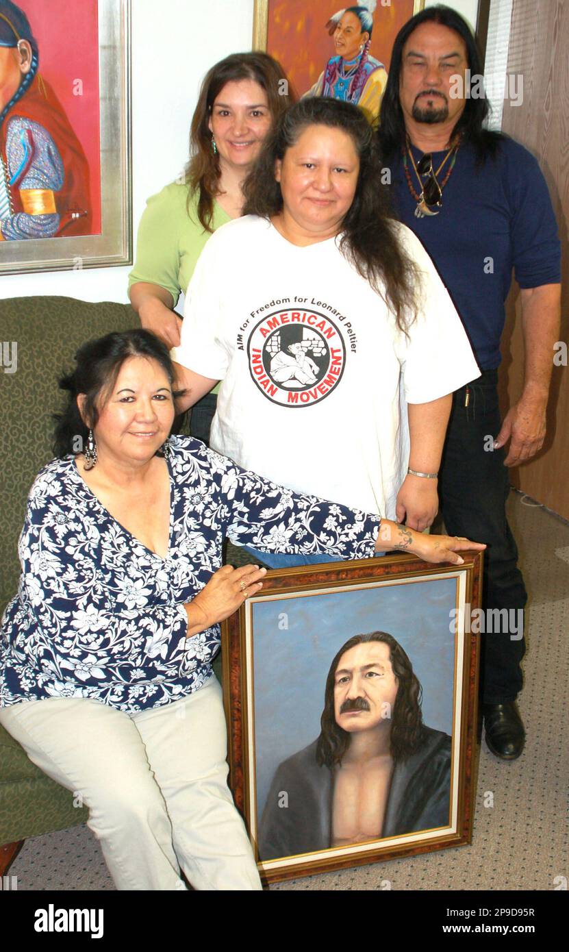 Members of the Leonard Peltier Defense Offense Committee include, from  left, Betty Ann Peltier-Solano, Kari Ann Cowan, Julia DeCoteau and David  Hill pose in Fargo, N.D., on Nov. 3, 2008. Peltier-Solano is