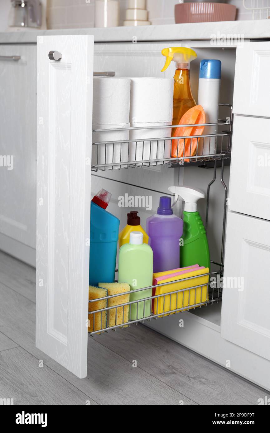 Cleaning supplies and tools on shelves and cabinets in pantry room Stock  Photo - Alamy