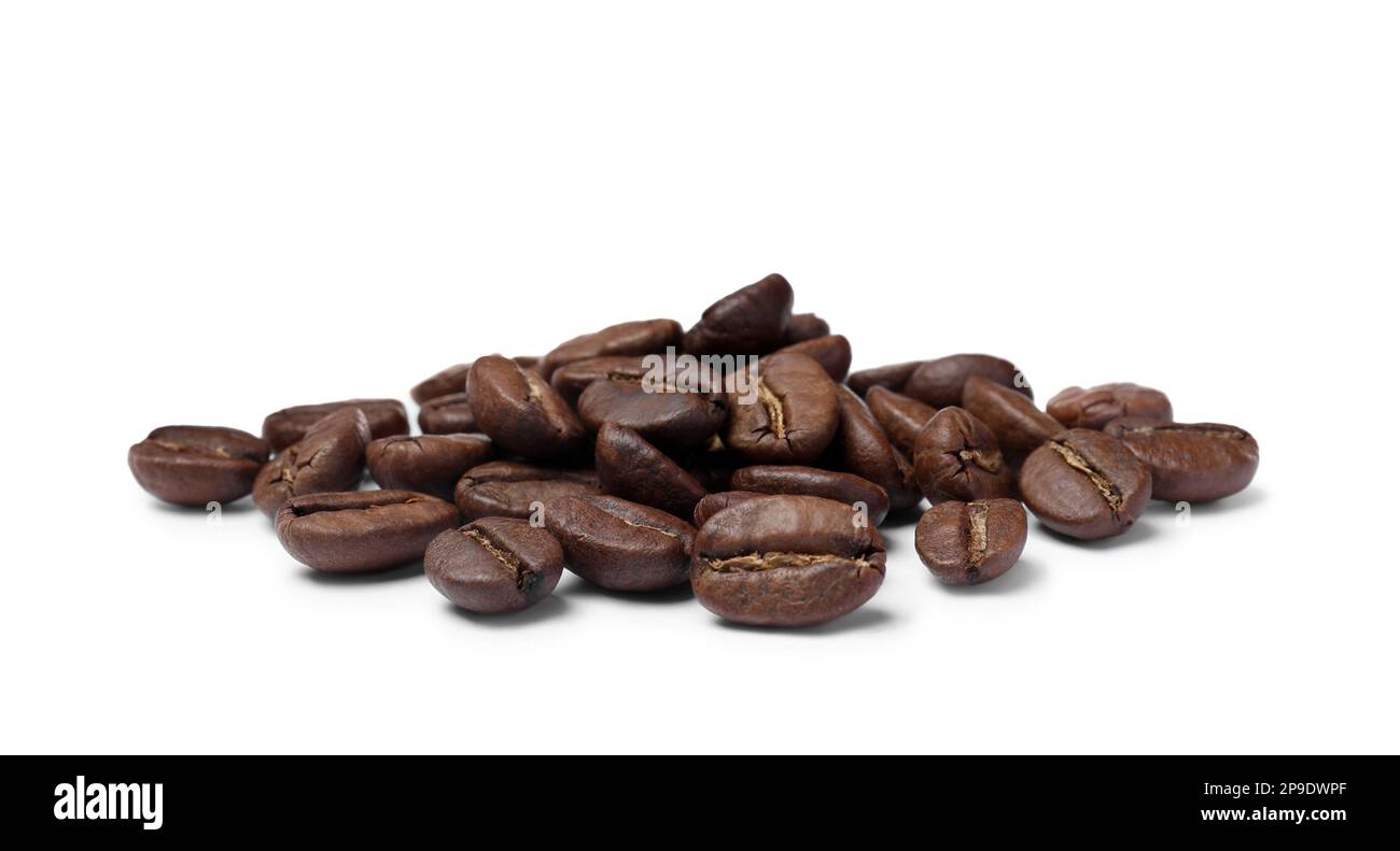 Pile of roasted coffee beans on white background Stock Photo - Alamy